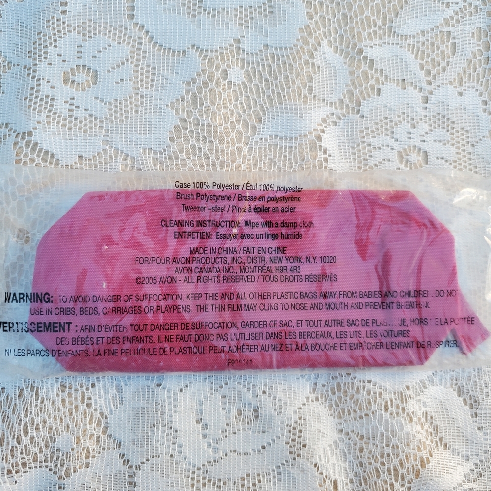 Avon, unopened small Pink bag with makeup brush and steel tweezer. NEW